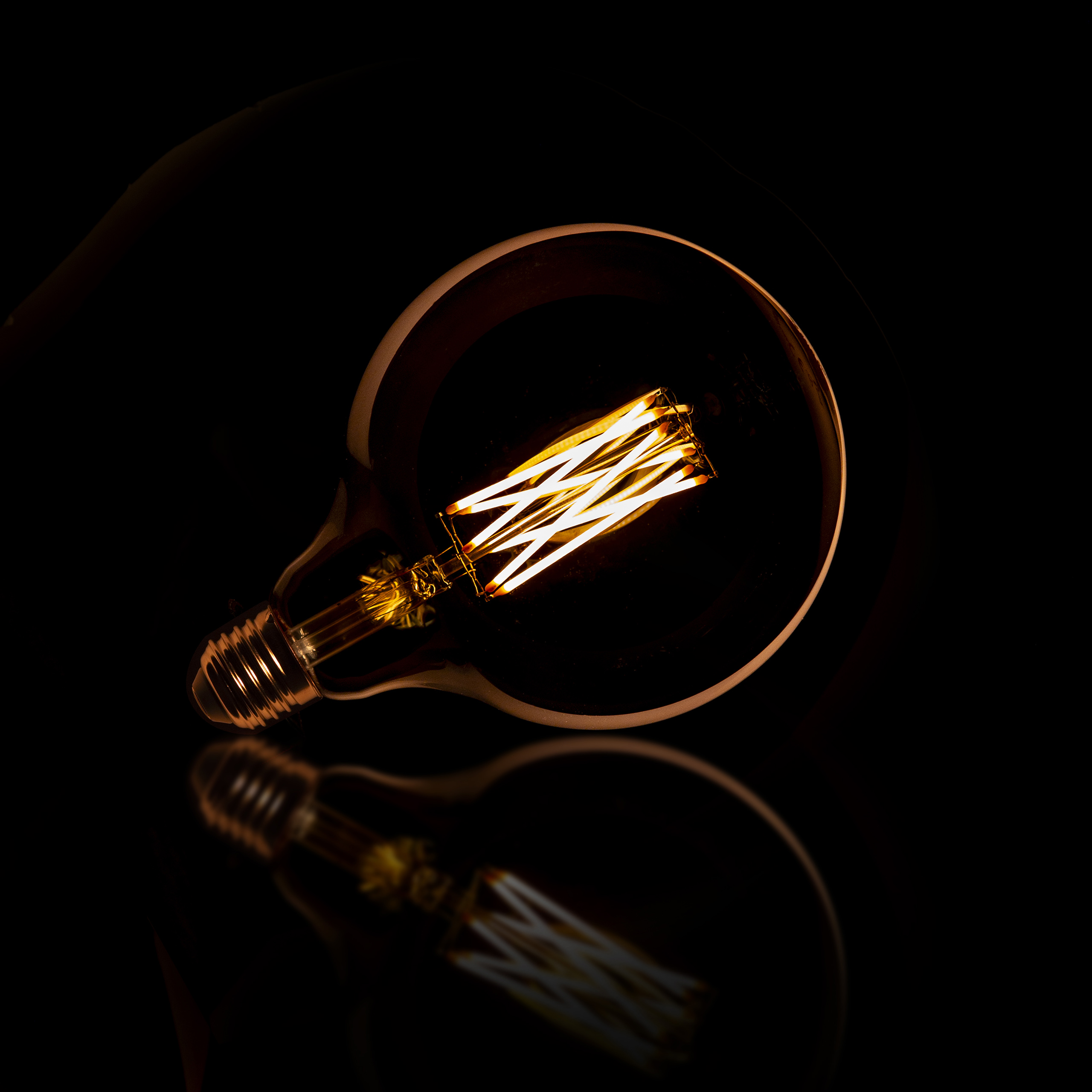 Source lumineuse Ampoule à filament LED [G125] Ø12,5 - E27 6W dimmable / Verre ambré