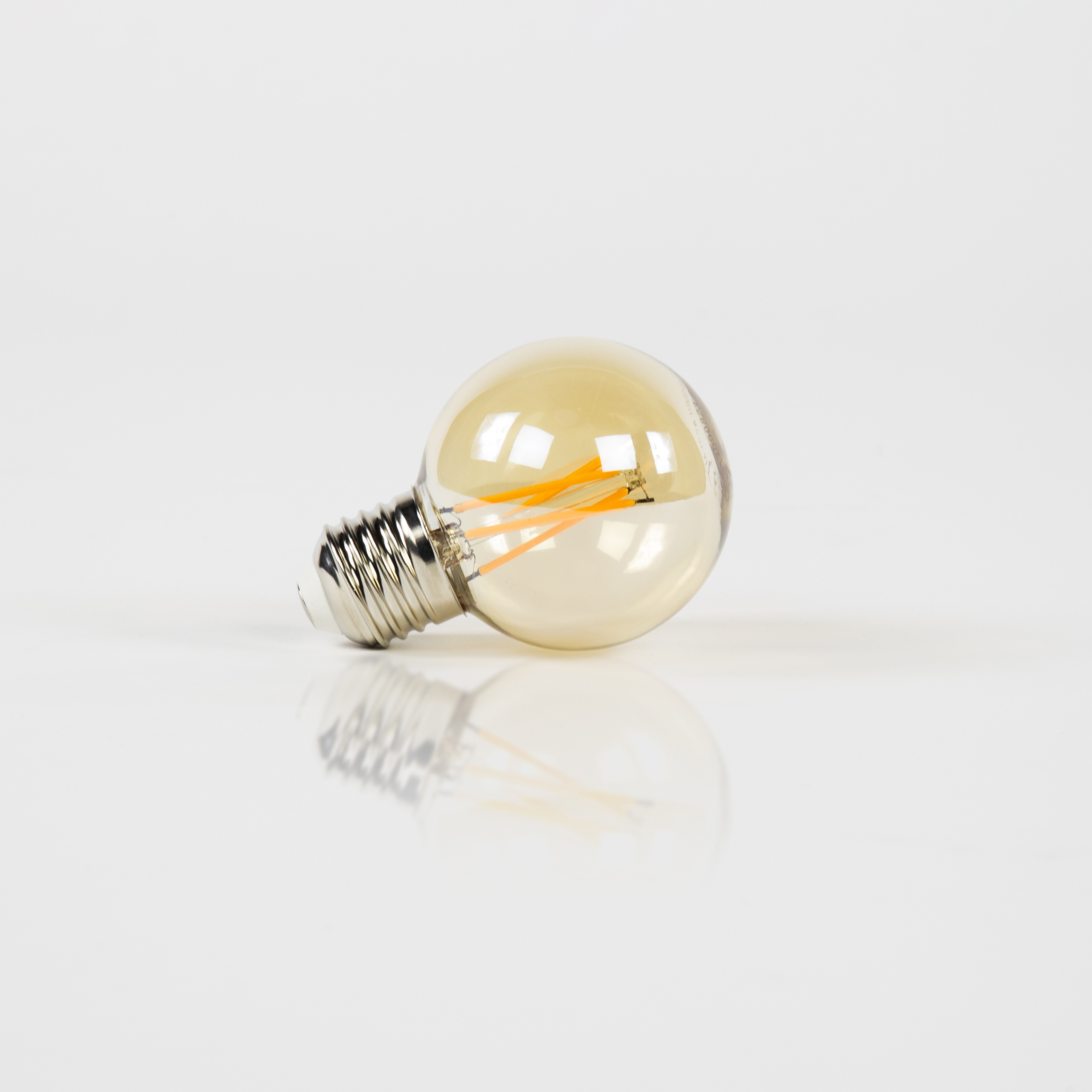 Source lumineuse LED [G60] boule à filament Ø6 / Verre ambré