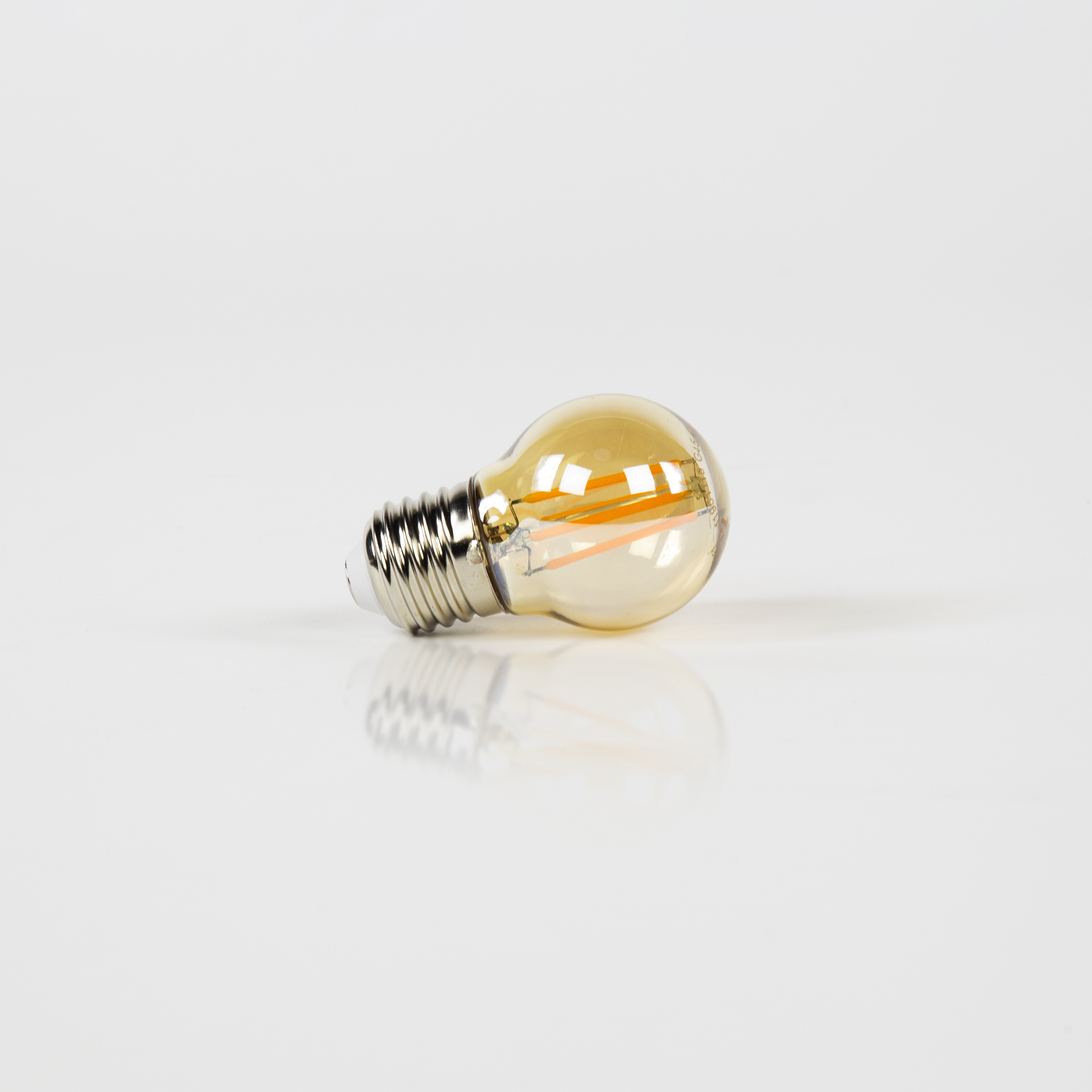 Ampoule LED à filament G45 Ø4,5 cm - Verre ambré